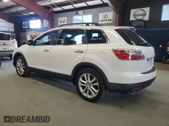 ✅ 2012 Mazda CX-9 Grand Touring • VIN: JM3TB3DV8C0352706 • Lot: 71443575. Wystawiony na Copart z przebiegiem 202 621 mil. Bezpłatny archiwum sprzedaży aukcyjnych z USA i szczegółowy raport historii pojazdu na DreamBid. Zdjęcie 2.