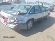 ✅ 1995 Buick Regal • VIN: 2G4WF52L8S1455808 • Lot: 43482395. Listed on IAAI with 174,231 mi. Free auction sales archive from the USA and detailed vehicle history report at DreamBid. Image 4.