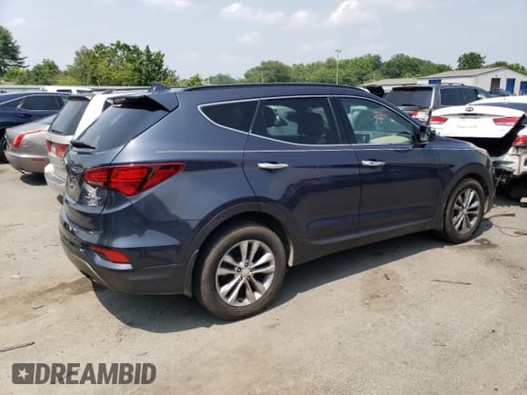✅ 2017 Hyundai Santa Fe 2.0T • VIN: 5XYZU4LA4HG457603 • Лот: 60413443. Опубликован ранее на Copart с пробегом 101 310 миль. Бесплатный доступ к архиву аукционных продаж из США и подробный отчёт об истории автомобиля на DreamBid. Изображение 3.
