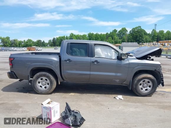 ✅ 2022 Nissan Frontier SV • VIN: 1N6ED1EK9NN633002 • Lot: 42298704. Listed on IAAI with 47,800 mi. Free auction sales archive from the USA and detailed vehicle history report at DreamBid. Image 12.