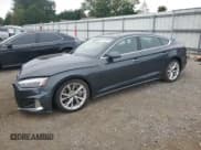 ✅ 2020 Audi A5 Sportback Premium Plus • VIN: WAUCNCF58LA021077 • Lot: 84053395. Listed on Copart with 77,749 mi. Free auction sales archive from the USA and detailed vehicle history report at DreamBid. Image 1.