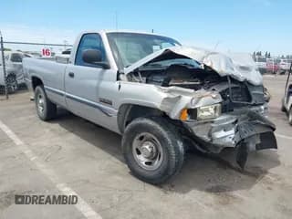 ✅ 1999 Dodge RAM • VIN: 3B7KC2665XM545187 • Lot: 42643952. Listed on IAAI with 172,688 mi. Free auction sales archive from the USA and detailed vehicle history report at DreamBid. Image 1.