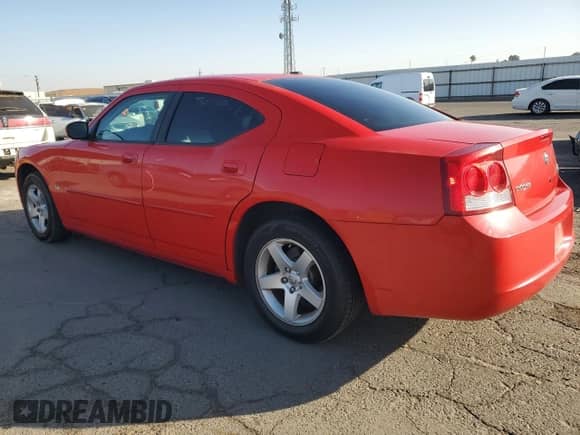 2010 Dodge Charger SXT with VIN 2B3CA3CV8AH118153, listed as a Copart auction lot 79950384 with 119,953 mi miles and Salvage title. Bid and sale history available at DreamBid. Image 2.