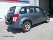 ✅ 2006 Suzuki Grand Vitara • VIN: JS3TE941564103262 • Lot: 43034358. Wystawiony na IAAI z przebiegiem 183 728 mil. Bezpłatny archiwum sprzedaży aukcyjnych z USA i szczegółowy raport historii pojazdu na DreamBid. Zdjęcie 4.