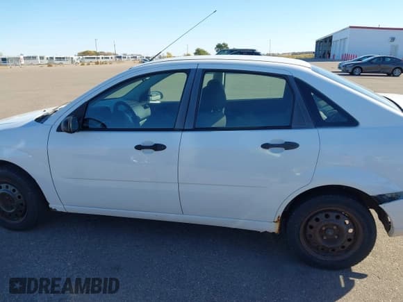 ✅ 2007 Ford Focus S • VIN: 1FAFP34NX7W308254 • Lot: 43590605. Listed on IAAI with 154,344 mi. Free auction sales archive from the USA and detailed vehicle history report at DreamBid. Image 14.