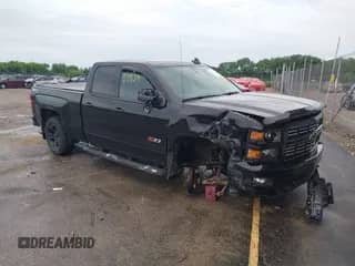 2015 Chevrolet Silverado 1500 LT with VIN 1GCVKREC5FZ305537, listed as a IAAI auction lot 42553539 with 188,139 mi miles and . Bid and sale history available at DreamBid. Image 1.