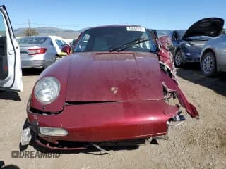 ✅ 1996 Porsche 911 • VIN: WP0AA2998TS322344 • Лот: 46862975. Опубликован ранее на Copart с пробегом 66 452 миль. Бесплатный доступ к архиву аукционных продаж из США и подробный отчёт об истории автомобиля на DreamBid. Изображение 5.