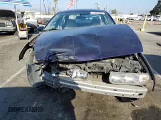 1996 Saturn SL z VIN 1G8ZH5283TZ240279, wystawiony jako Copart lot #71824084 z przebiegiem 89 475 mil mil oraz Szkoda całkowita • Salvage title. Historia ofert i sprzedaży dostępna na DreamBid. Obrazek 5.