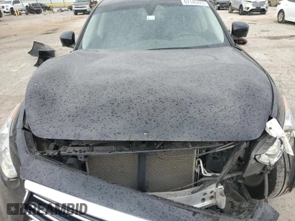 ✅ 2015 Infiniti QX70 • VIN: JN8CS1MW2FM483850 • Лот: 67140425. Опубликован ранее на Copart с пробегом 49 423 миль. Бесплатный доступ к архиву аукционных продаж из США и подробный отчёт об истории автомобиля на DreamBid. Изображение 12.