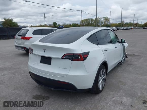✅ 2021 Tesla Model Y Long Range • VIN: 5YJYGDEE6MF298085 • Lot: 43417144. Listed on IAAI with 64,528 mi. Free auction sales archive from the USA and detailed vehicle history report at DreamBid. Image 4.