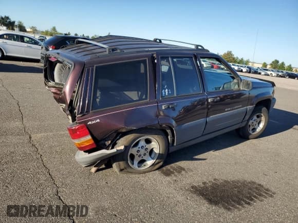✅ 1996 Jeep Grand Cherokee Laredo • VIN: 1J4GZ58S4TC213568 • Lot: 85765615. Listed on Copart with Not provided. Free auction sales archive from the USA and detailed vehicle history report at DreamBid. Image 3.