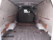 ✅ 2013 Ford Econoline Cargo Commercial • VIN: 1FTNS2ELXDDA38381 • Lot: 41243450. Wystawiony na IAAI z przebiegiem 143 160 mil. Bezpłatny archiwum sprzedaży aukcyjnych z USA i szczegółowy raport historii pojazdu na DreamBid. Zdjęcie 8.