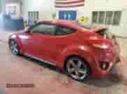2013 Hyundai Veloster Turbo z VIN KMHTC6AE5DU142985, wystawiony jako Copart lot #82005395 z przebiegiem 122 689 mil mil oraz Czysty tytuł • Clean title. Historia ofert i sprzedaży dostępna na DreamBid. Obrazek 2.