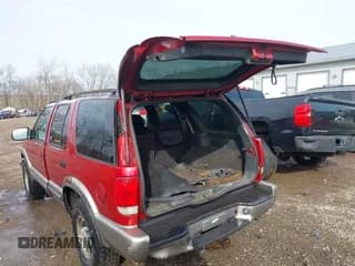 ✅ 2000 Chevrolet Blazer LT • VIN: 1GNDT13W2Y2163805 • Lot: 41537780. Wystawiony na IAAI z przebiegiem 170 527 mil. Bezpłatny archiwum sprzedaży aukcyjnych z USA i szczegółowy raport historii pojazdu na DreamBid. Zdjęcie 3.