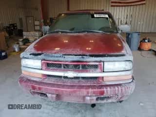 2003 Chevrolet Blazer LS z VIN 1GNCT18XX3K123137, wystawiony jako Copart lot #41683155 z przebiegiem 129 105 mil mil oraz Nie do naprawy • Non repairable. Historia ofert i sprzedaży dostępna na DreamBid. Obrazek 5.