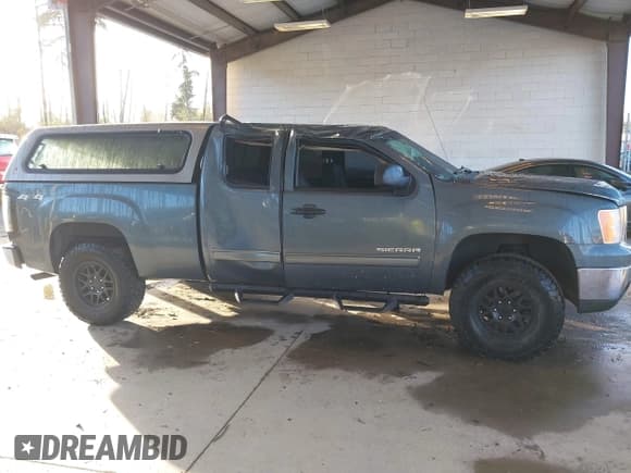 ✅ 2011 GMC Sierra 1500 SLE • VIN: 1GTR2VE30BZ398536 • Лот: 43562628. Опубликован ранее на IAAI с пробегом 166 547 миль. Бесплатный доступ к архиву аукционных продаж из США и подробный отчёт об истории автомобиля на DreamBid. Изображение 13.