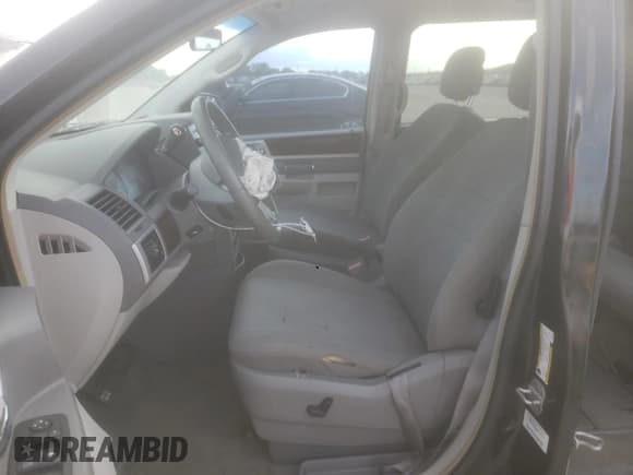 ✅ 2010 Chrysler Town & Country Touring • VIN: 2A4RR5D17AR305638 • Лот: 93325415. Опубликован ранее на Copart с пробегом 199 342 миль. Бесплатный доступ к архиву аукционных продаж из США и подробный отчёт об истории автомобиля на DreamBid. Изображение 7.