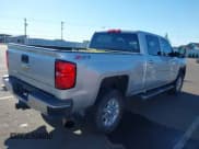 ✅ 2015 Chevrolet Silverado 2500HD LT • VIN: 1GC1KVE83FF653342 • Lot: 41970275. Listed on IAAI with 130,535 mi. Free auction sales archive from the USA and detailed vehicle history report at DreamBid. Image 4.