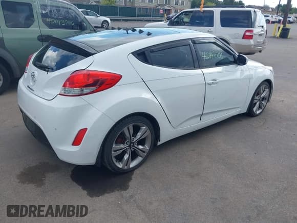 ✅ 2012 Hyundai Veloster w/Gray Int • VIN: KMHTC6AD8CU048797 • Lot: 42998706. Wystawiony na IAAI z przebiegiem 130 045 mil. Bezpłatny archiwum sprzedaży aukcyjnych z USA i szczegółowy raport historii pojazdu na DreamBid. Zdjęcie 4.