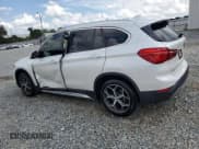 ✅ 2019 BMW X1 sDrive28i • VIN: WBXHU7C51K5L11243 • Lot: 61818985. Wystawiony na Copart z przebiegiem 64 734 mil. Bezpłatny archiwum sprzedaży aukcyjnych z USA i szczegółowy raport historii pojazdu na DreamBid. Zdjęcie 2.