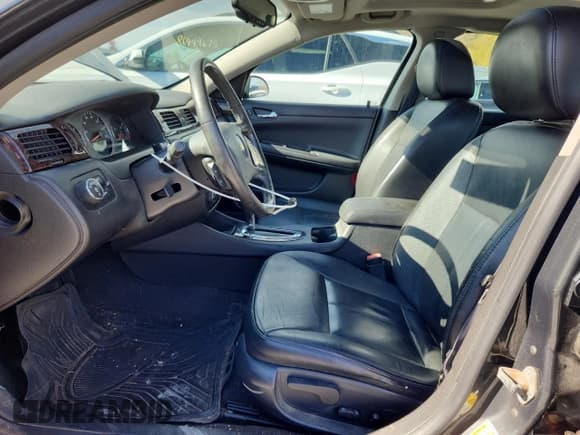 ✅ 2014 Chevrolet Impala LTZ • VIN: 2G1WC5E3XE1108387 • Lot: 82546555. Listed on Copart with 213,398 mi. Free auction sales archive from the USA and detailed vehicle history report at DreamBid. Image 7.