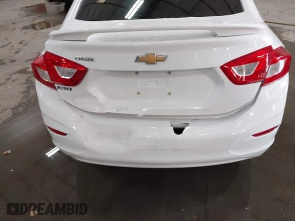 ✅ 2016 Chevrolet Cruze LS • VIN: 1G1BB5SMXG7272517 • Lot: 41283610. Listed on IAAI with 57,497 mi. Free auction sales archive from the USA and detailed vehicle history report at DreamBid. Image 6.