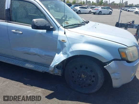 ✅ 2008 Mercury Mariner • VIN: 4M2CU81198KJ06044 • Лот: 42466023. Опубликован ранее на IAAI с пробегом 165 545 миль. Бесплатный доступ к архиву аукционных продаж из США и подробный отчёт об истории автомобиля на DreamBid. Изображение 6.