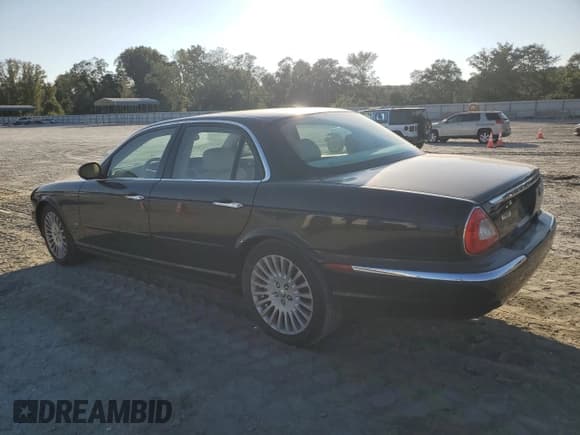 ✅ 2006 Jaguar XJ Series XJ8 • VIN: SAJWA71BX6SH04689 • Lot: 80373275. Listed on Copart with 94,692 mi. Free auction sales archive from the USA and detailed vehicle history report at DreamBid. Image 2.