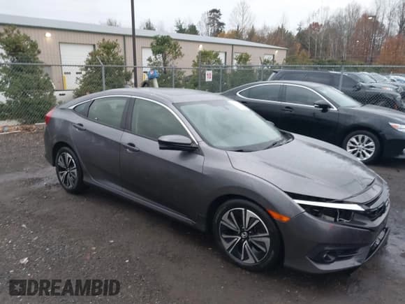 ✅ 2018 Honda Civic EX-T • VIN: JHMFC1F34JX029310 • Lot: 43770255. Listed on IAAI with 71,655 mi. Free auction sales archive from the USA and detailed vehicle history report at DreamBid. Image 1.