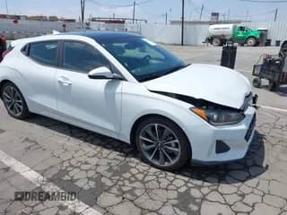 2019 Hyundai Veloster Premium z VIN KMHTG6AF9KU009835, wystawiony jako IAAI lot #42561187 z przebiegiem 42 763 mil mil oraz . Historia ofert i sprzedaży dostępna na DreamBid. Obrazek 1.