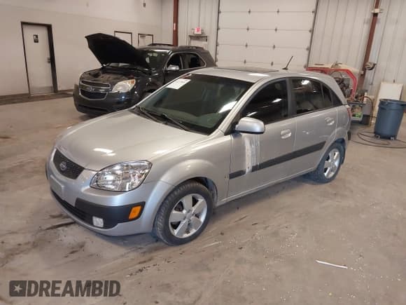 ✅ 2009 Kia Rio SX • VIN: KNADE243096570901 • Lot: 42237845. Listed on IAAI with 213,271 mi. Free auction sales archive from the USA and detailed vehicle history report at DreamBid. Image 2.