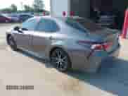 2021 Toyota Camry SE with VIN 4T1G11BK6MU029724, listed as a IAAI auction lot 42686894 with 92,496 mi miles and . Bid and sale history available at DreamBid. Image 3.