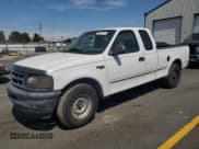✅ 1997 Ford F-150 XL • VIN: 1FTEX17L9VKB79741 • Lot: 60880145. Listed on Copart with 163,643 mi. Free auction sales archive from the USA and detailed vehicle history report at DreamBid. Image 1.