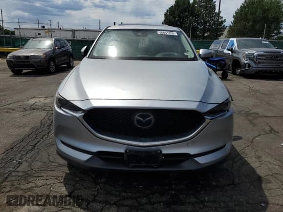 ✅ 2018 Mazda CX-5 Grand Touring • VIN: JM3KFADMXJ1375195 • Lot: 66651055. Wystawiony na Copart z przebiegiem 66 800 mil. Bezpłatny archiwum sprzedaży aukcyjnych z USA i szczegółowy raport historii pojazdu na DreamBid. Zdjęcie 5.