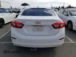 ✅ 2016 Chevrolet Cruze LT • VIN: 1G1BE5SM0G7322154 • Lot: 43983753. Listed on Copart with 129,122 mi. Free auction sales archive from the USA and detailed vehicle history report at DreamBid. Image 6.