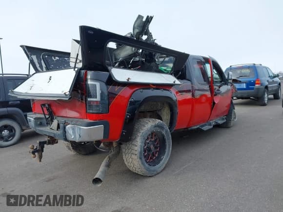 ✅ 2007 GMC Sierra 2500HD SLE2 • VIN: 1GTHK29627E596516 • Лот: 41382686. Опубликован ранее на IAAI с пробегом Не указан. Бесплатный доступ к архиву аукционных продаж из США и подробный отчёт об истории автомобиля на DreamBid. Изображение 4.