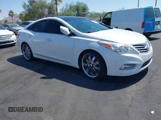 2014 Hyundai Azera Limited z VIN KMHFH4JG2EA333397, wystawiony jako IAAI lot #42610633 z przebiegiem 128 952 mil mil oraz . Historia ofert i sprzedaży dostępna na DreamBid. Obrazek 1.