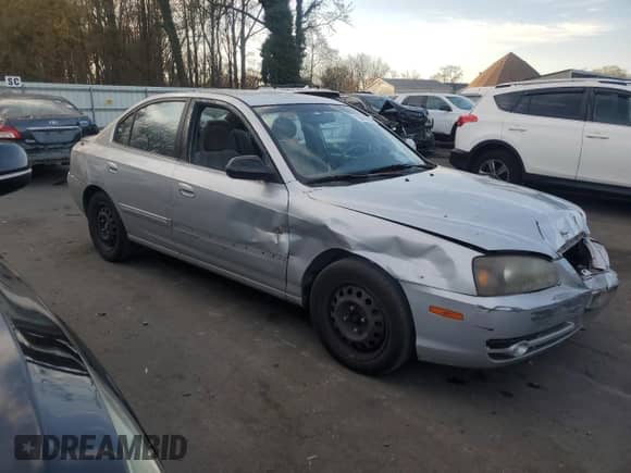 2005 Hyundai Elantra GLS with VIN KMHDN46D65U024593, listed as a Copart auction lot 78614304 with 107,691 mi miles and Salvage title. Bid and sale history available at DreamBid. Image 4.
