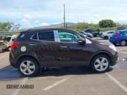 ✅ 2015 Buick Encore Premium • VIN: KL4CJDSB8FB159145 • Lot: 42662868. Listed on IAAI with 118,673 mi. Free auction sales archive from the USA and detailed vehicle history report at DreamBid. Image 13.