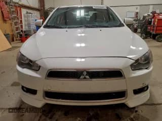 ✅ 2014 Mitsubishi Lancer ES • VIN: JA32U2FU5EU604466 • Lot: 94666035. Listed on Copart with 129,583 mi. Free auction sales archive from the USA and detailed vehicle history report at DreamBid. Image 5.