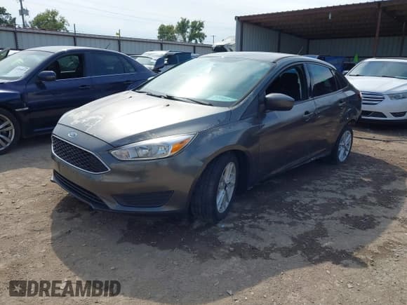 ✅ 2018 Ford Focus SE • VIN: 1FADP3FE6JL269966 • Лот: 43401107. Опубликован ранее на IAAI с пробегом 77 865 миль. Бесплатный доступ к архиву аукционных продаж из США и подробный отчёт об истории автомобиля на DreamBid. Изображение 2.