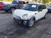 ✅ 2010 MINI Hardtop • VIN: WMWMF3C50ATZ28252 • Lot: 43392907. Listed on IAAI with 113,883 mi. Free auction sales archive from the USA and detailed vehicle history report at DreamBid. Image 2.