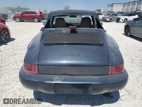 ✅ 1990 Porsche 911 • VIN: WP0CB2963LS471823 • Lot: 48498625. Wystawiony na Copart z przebiegiem 141 461 mil. Bezpłatny archiwum sprzedaży aukcyjnych z USA i szczegółowy raport historii pojazdu na DreamBid. Zdjęcie 6.