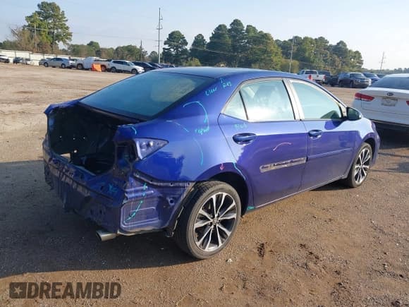 ✅ 2018 Toyota Corolla LE • VIN: 5YFBURHE1JP815087 • Lot: 43522480. Listed on IAAI with 97,514 mi. Free auction sales archive from the USA and detailed vehicle history report at DreamBid. Image 4.