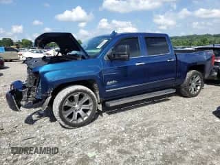 2018 Chevrolet Silverado 1500 High Country с VIN 3GCUKTEJ1JG419535, выставлен на аукционе Copart как лот 64389945 с пробегом 113 452 миль миль и Списание • Salvage title. История ставок и продаж доступна на DreamBid. Изображение 1.