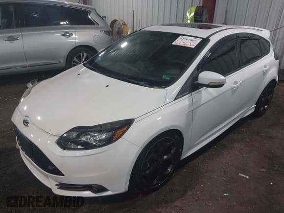 ✅ 2013 Ford Focus ST • VIN: 1FADP3L93DL241506 • Lot: 42907866. Listed on IAAI with 169,687 mi. Free auction sales archive from the USA and detailed vehicle history report at DreamBid. Image 18.