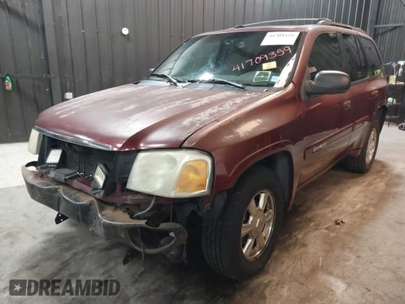 ✅ 2002 GMC Envoy SLT • VIN: 1GKDT13SX22426320 • Lot: 41709359. Listed on IAAI with 104,418 mi. Free auction sales archive from the USA and detailed vehicle history report at DreamBid. Image 2.