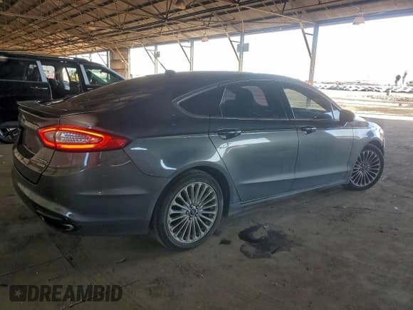 ✅ 2016 Ford Fusion Titanium • VIN: 3FA6P0K97GR174732 • Lot: 94671095. Wystawiony na Copart z przebiegiem 166 887 mil. Bezpłatny archiwum sprzedaży aukcyjnych z USA i szczegółowy raport historii pojazdu na DreamBid. Zdjęcie 3.