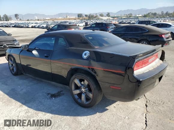✅ 2014 Dodge Challenger R/T • VIN: 2C3CDYBT3EH158587 • Lot: 81528755. Listed on Copart with 154,548 mi. Free auction sales archive from the USA and detailed vehicle history report at DreamBid. Image 2.