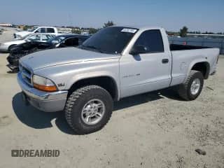2000 Dodge Dakota with VIN 1B7GG26X1YS546719, listed as a Copart auction lot 64782765 with 139,640 mi miles and Salvage title. Bid and sale history available at DreamBid. Image 1.